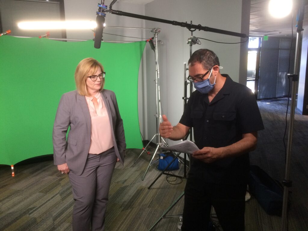 Going over script in front of green screen